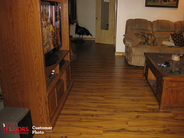 A richly colored Cabin Grade floor in a living room A richly colored floor in a living room